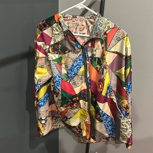 Johnny was reversible rain jacket/ wind breaker